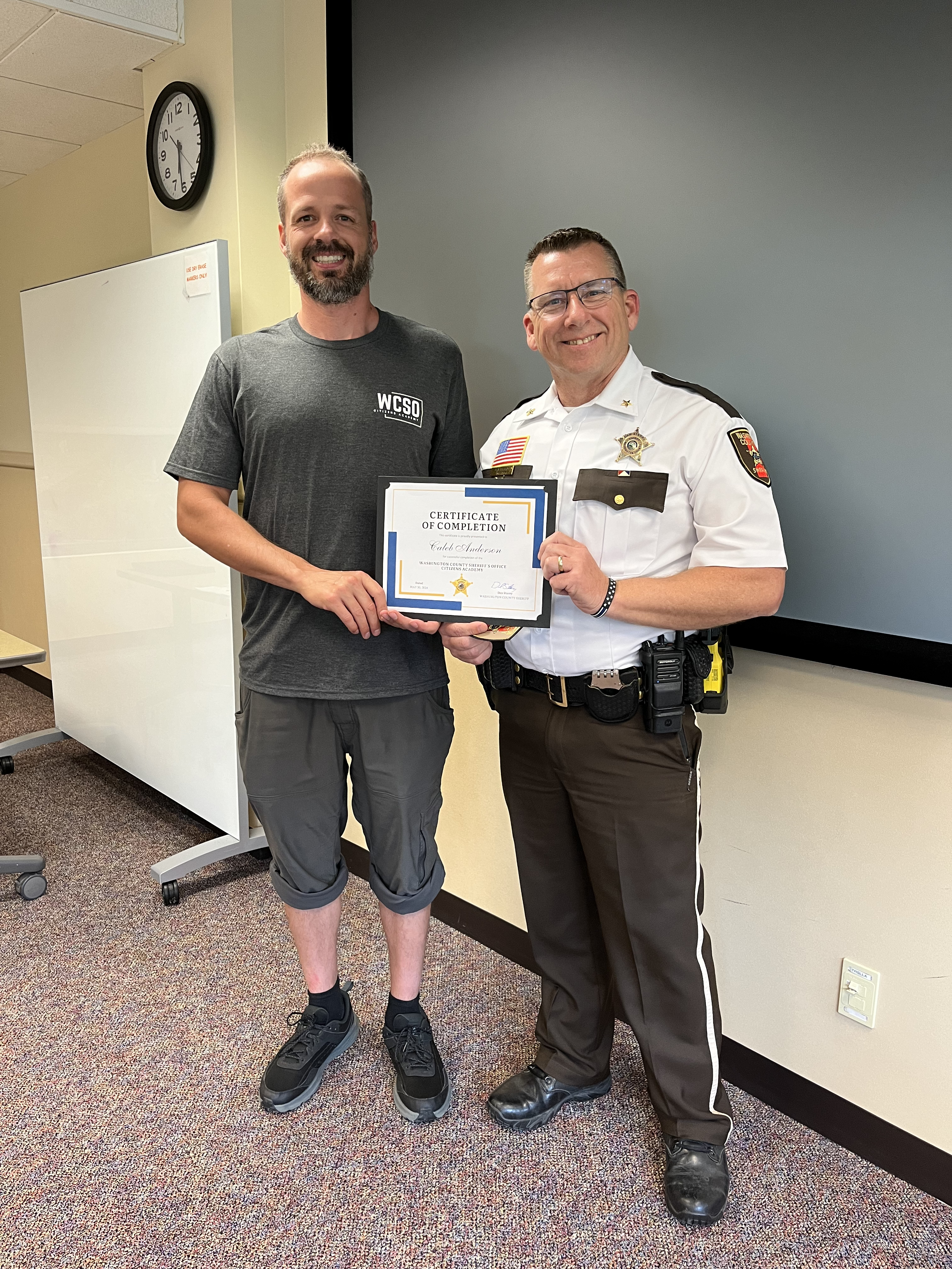 citizens academy pose with cert